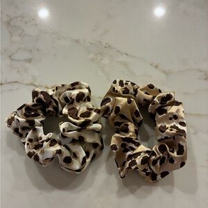 2 Leopard Print Scrunchies. Small ones that look very good on! Almost new!